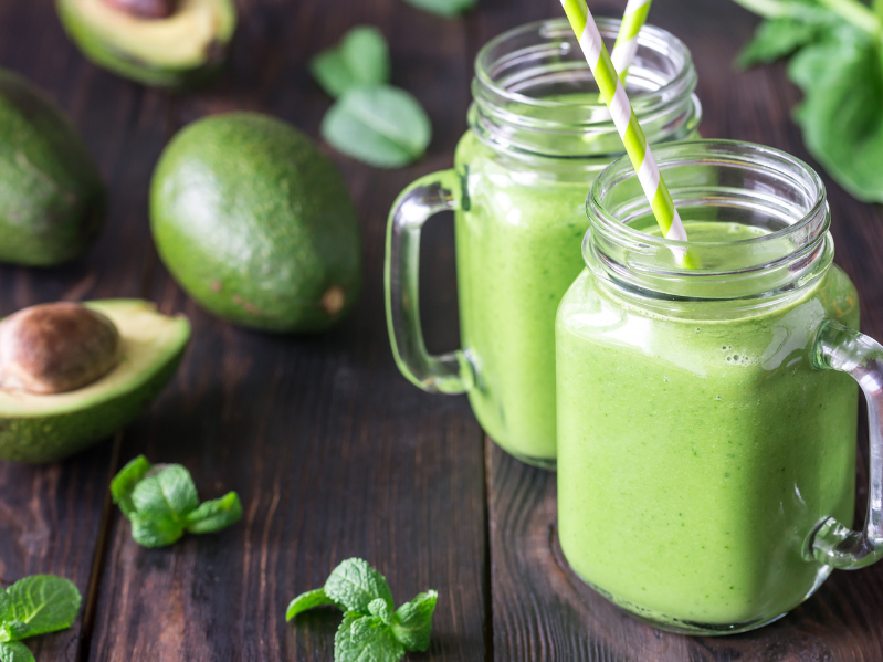 green avocado smoothie in glass jar